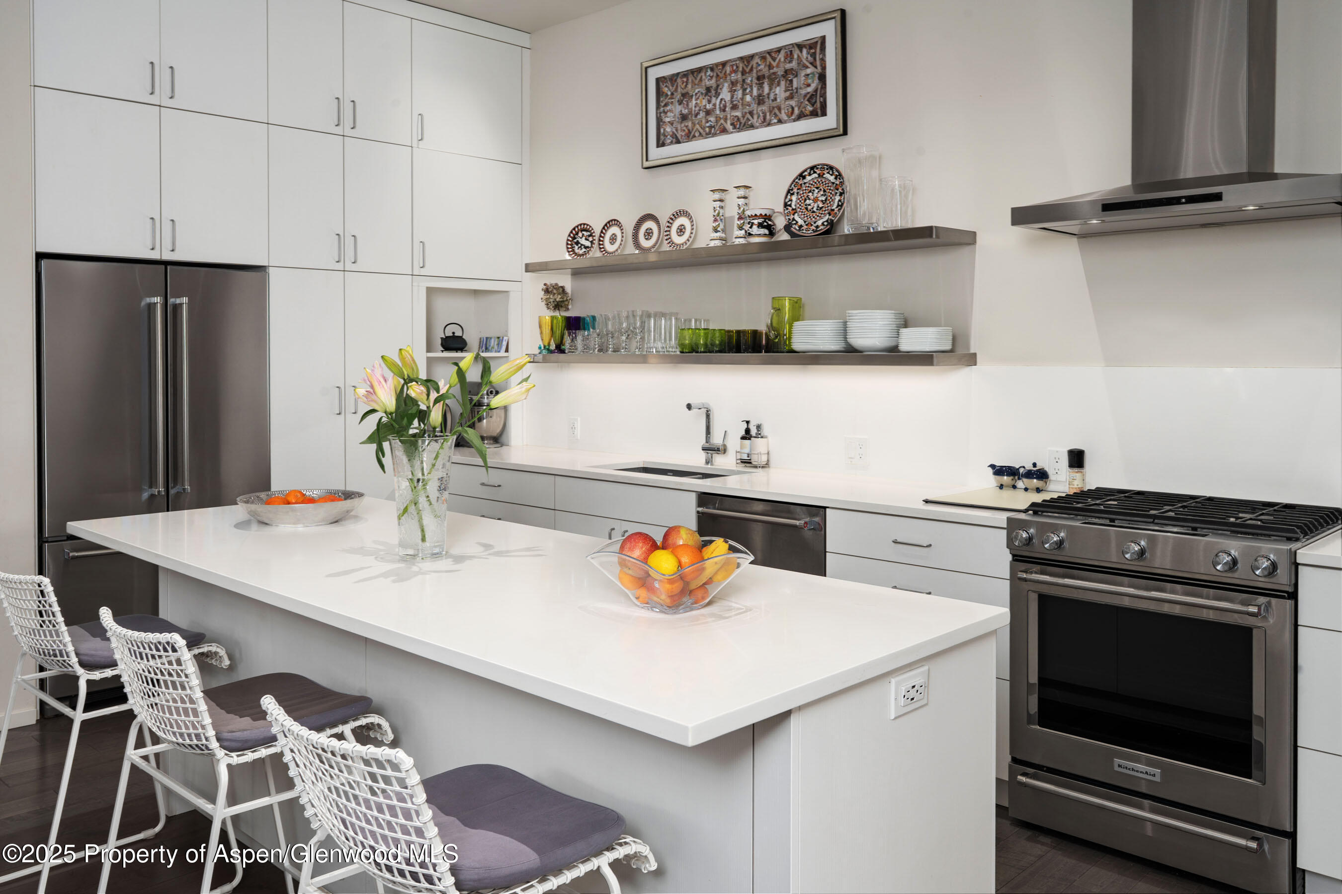 102 Evans Road, Unit 104 Basalt, CO 81621 - Photo 17 of 44 a kitchen with stainless steel appliances granite countertop a sink and a stove