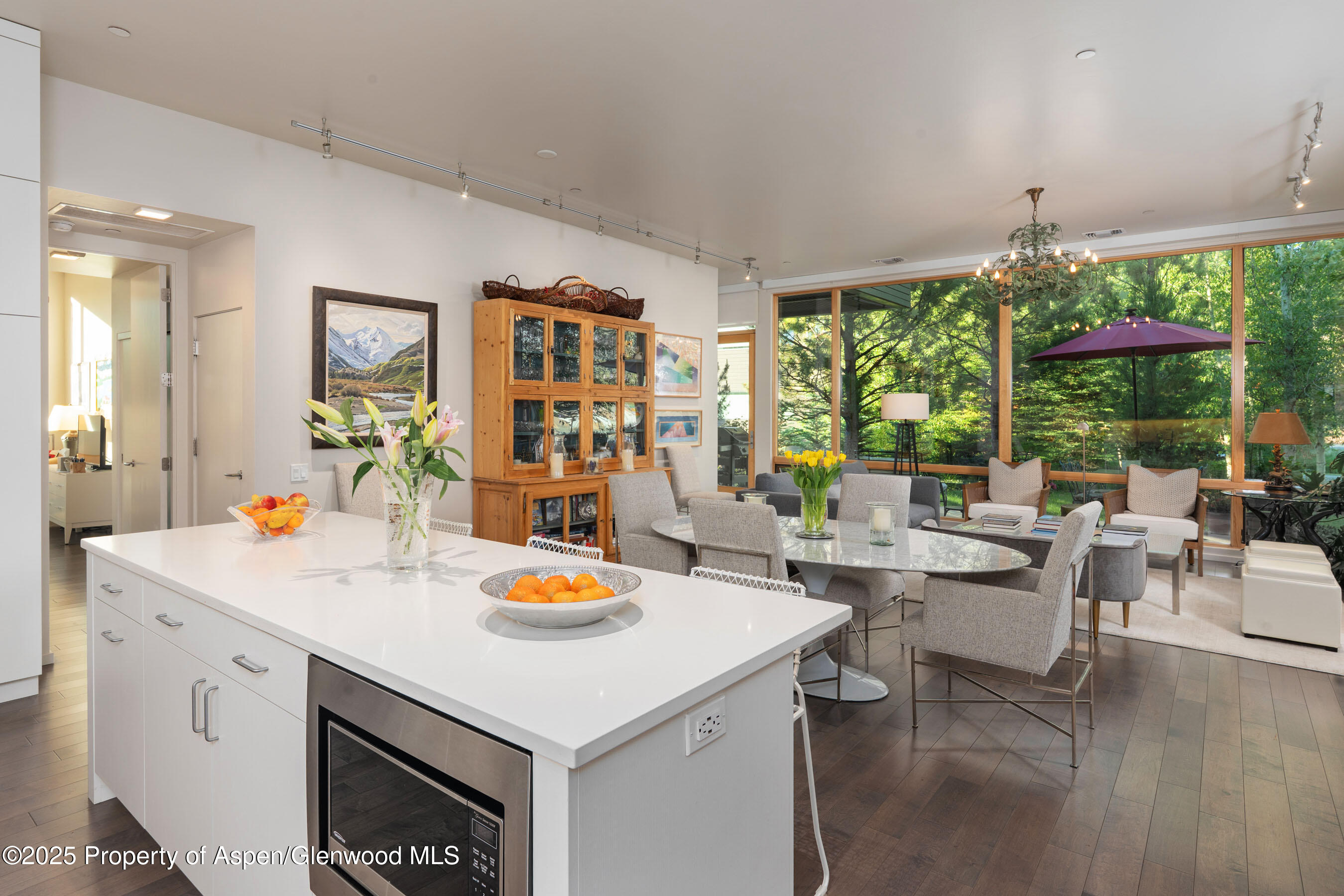 102 Evans Road, Unit 104 Basalt, CO 81621 - Photo 19 of 44 a view of open kitchen with dining table and chairs