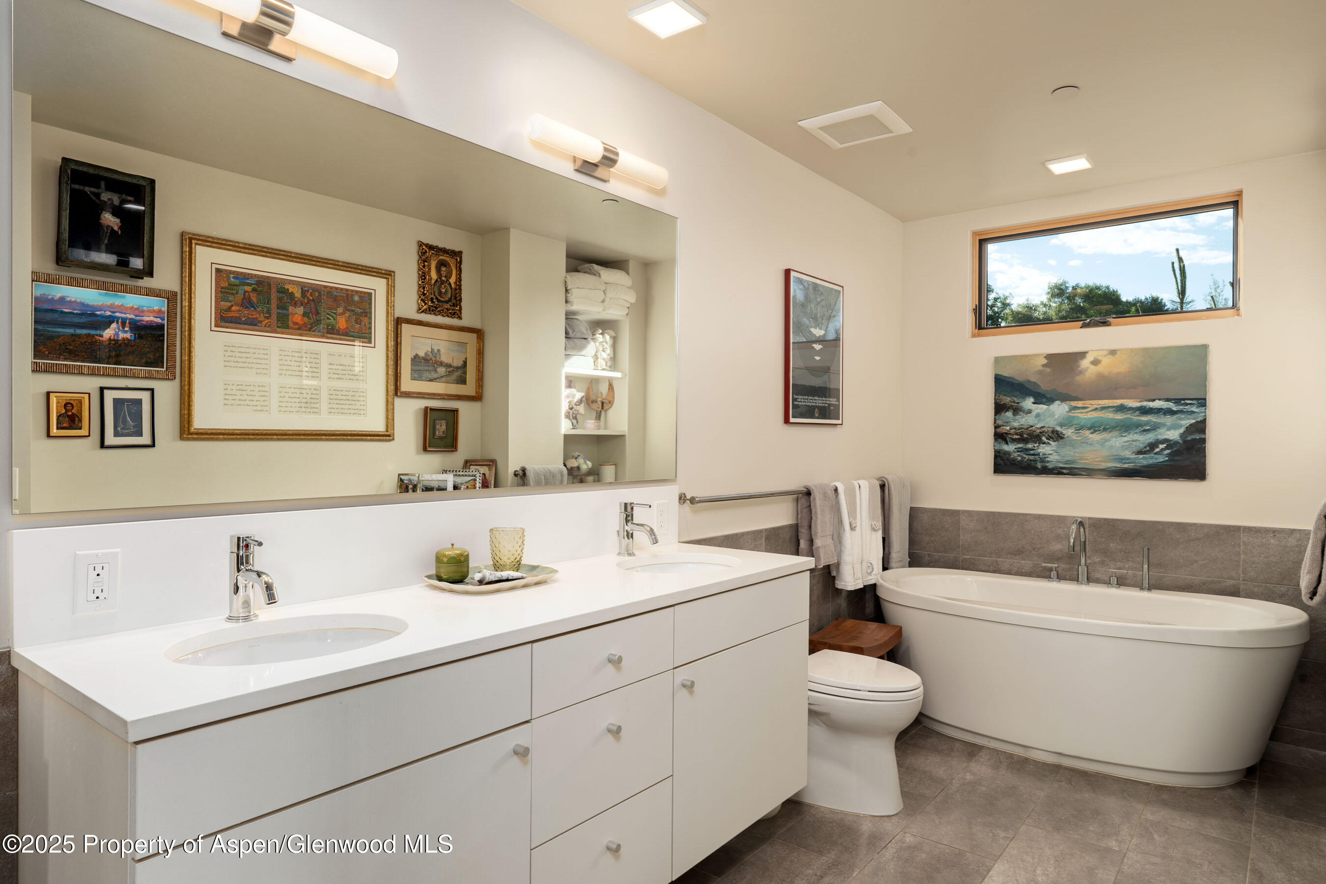 102 Evans Road, Unit 104 Basalt, CO 81621 - Photo 22 of 44 a bathroom with a toilet a sink and a bathtub