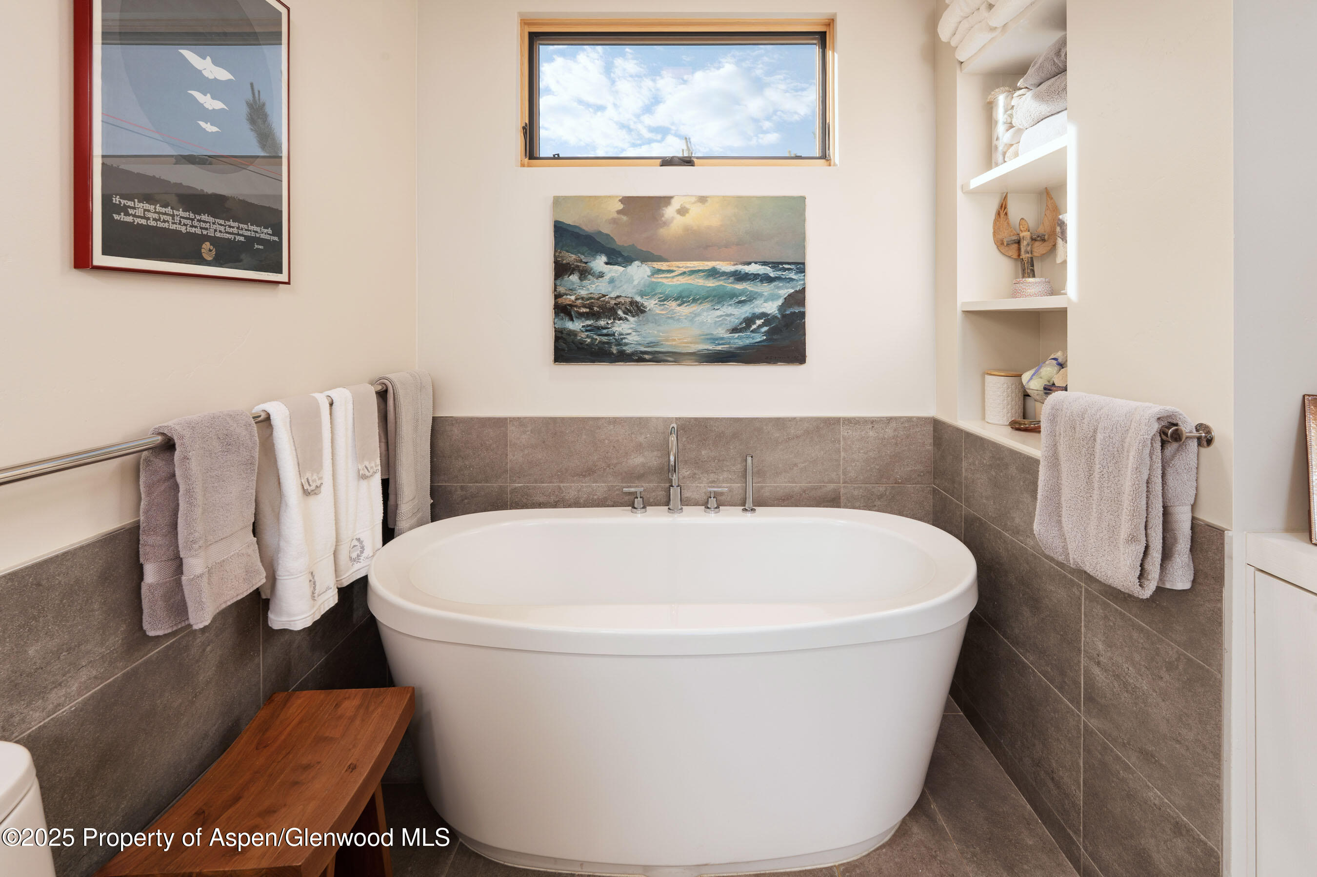 102 Evans Road, Unit 104 Basalt, CO 81621 - Photo 23 of 44 a white bath tub sitting in a bathroom