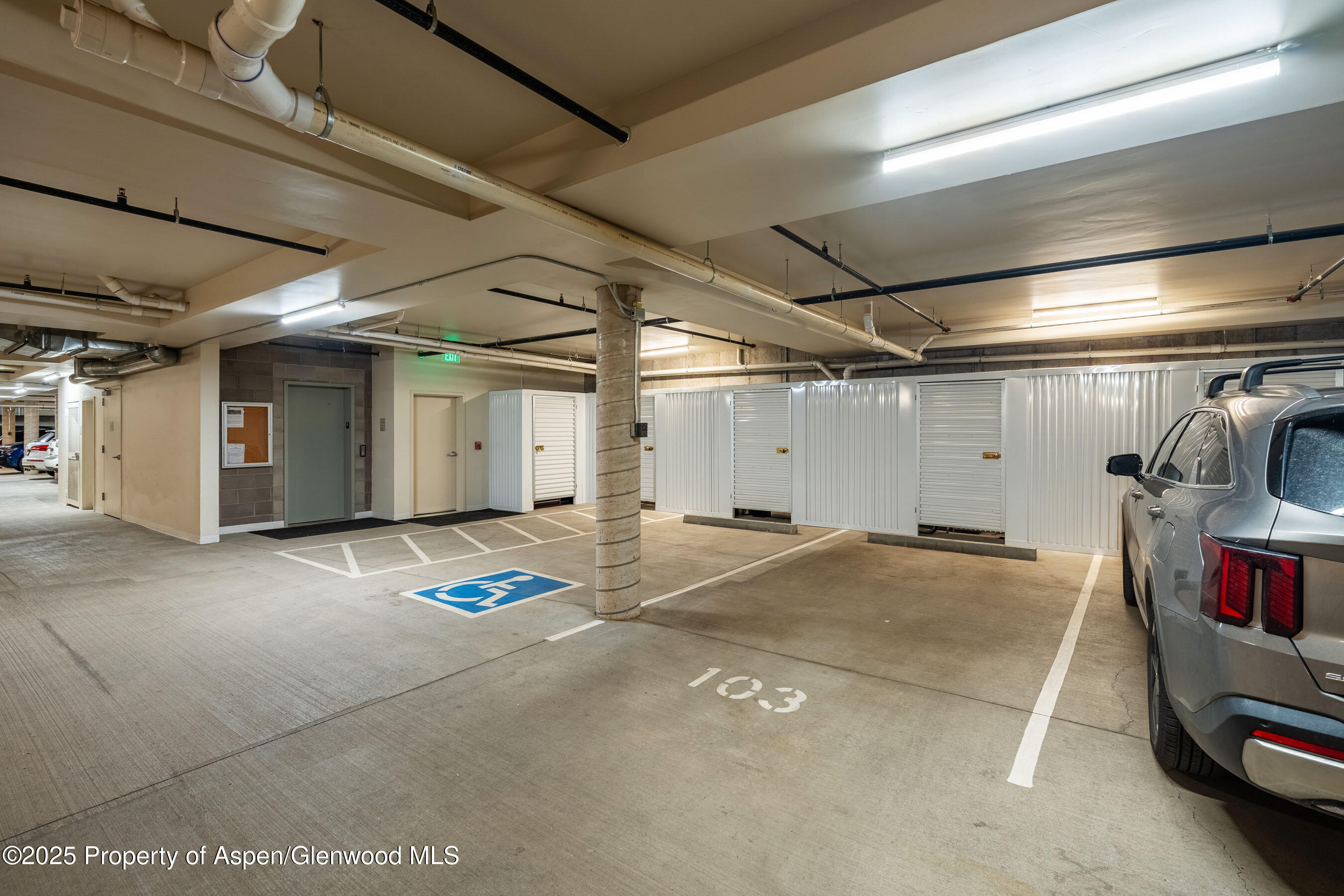 102 Evans Road, Unit 104 Basalt, CO 81621 - Photo 33 of 44 a view of parking garage with cars