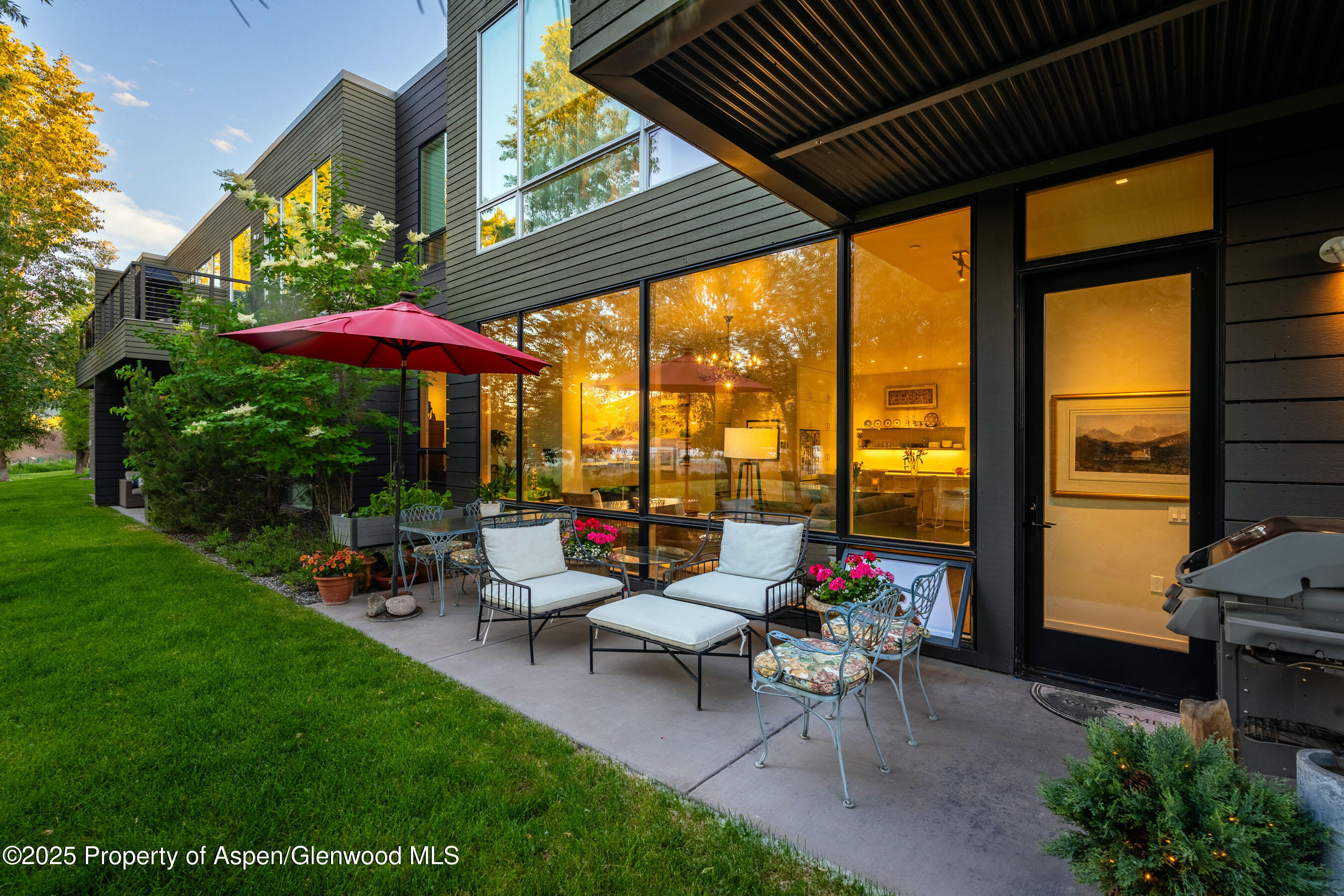 102 Evans Road, Unit 104 Basalt, CO 81621 - Photo 39 of 44 a group of chairs sitting in patio and a fire pit