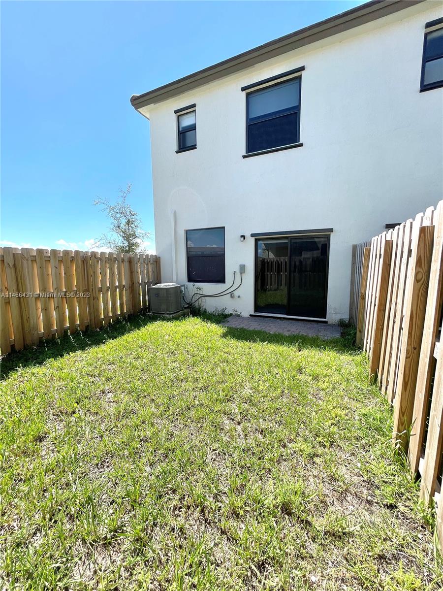 23373 Southwest 129th Path, Unit 23373 Miami, FL 33186 - Photo 19 of 20 a view of outdoor space and yard