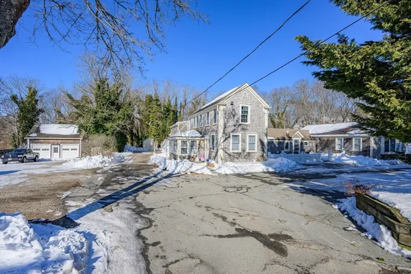 a view of a house with a yard