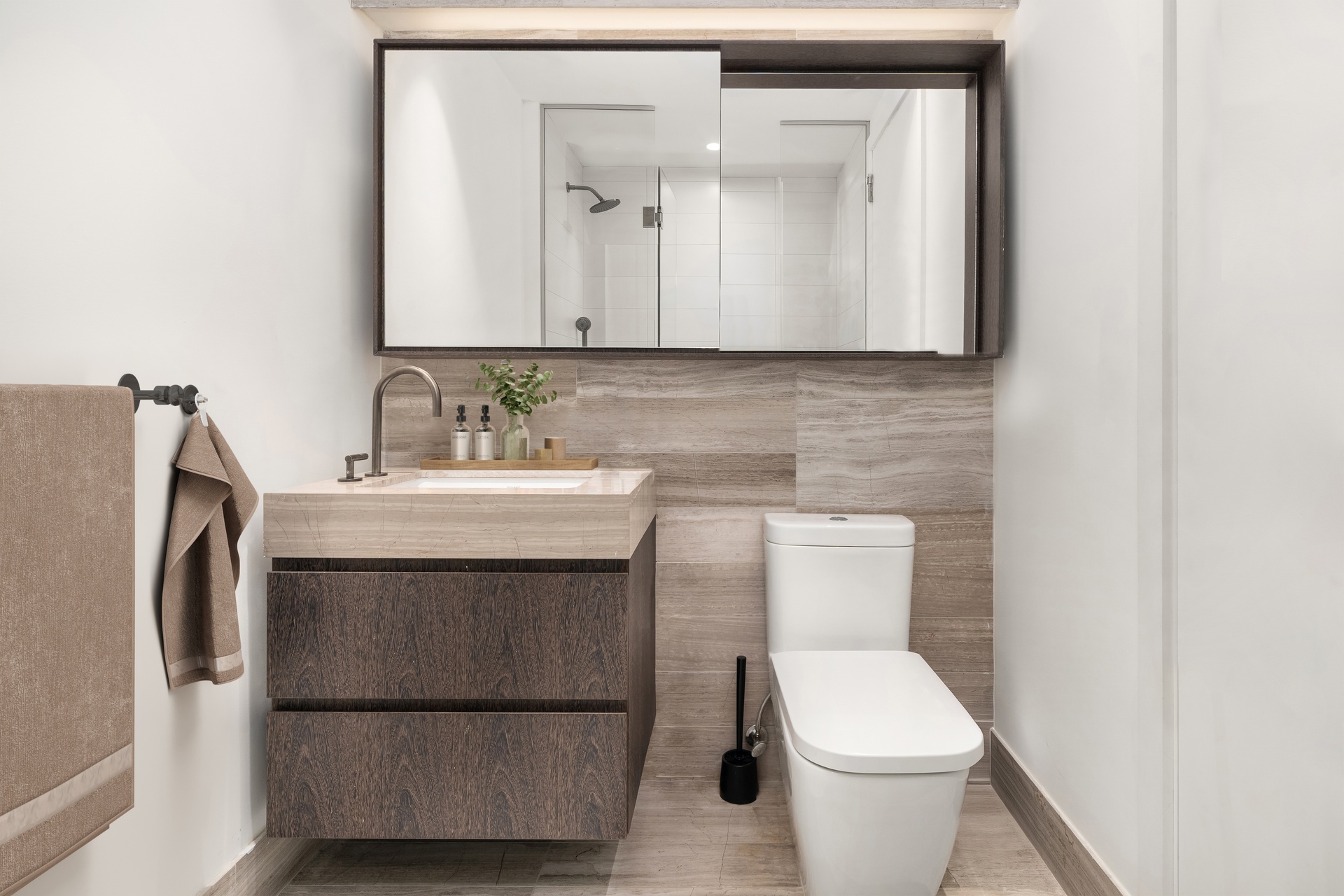 225 14th Street, Unit GARDENA Brooklyn, NY 11215 - Photo 13 of 14 a bathroom with a toilet sink and mirror