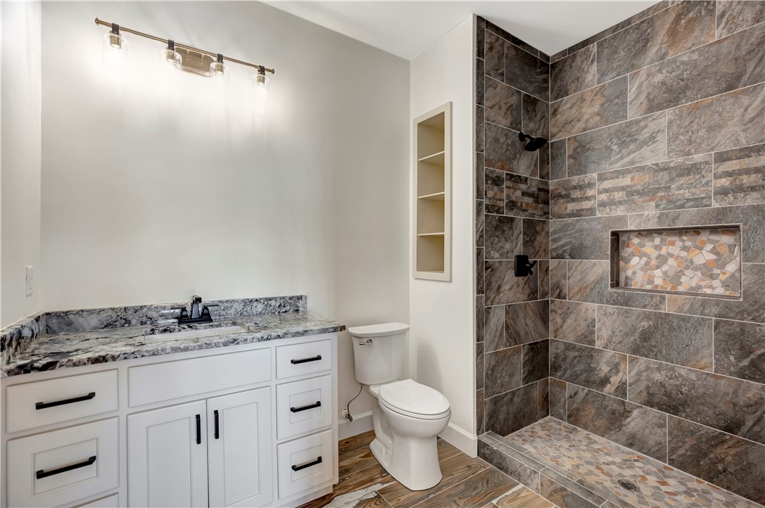 327 McAlister Road West Union, SC 29696 - Photo 34 of 45 Second Bath downstairs. Mirrors and Shower Door in