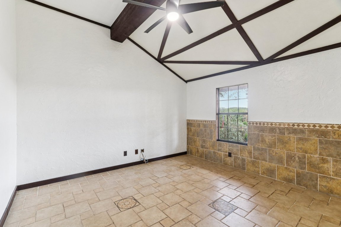 24369-2 Bingham Creek Road, Unit 12 Leander, TX 78641 - Photo 16 of 22 a view of an empty room with a window