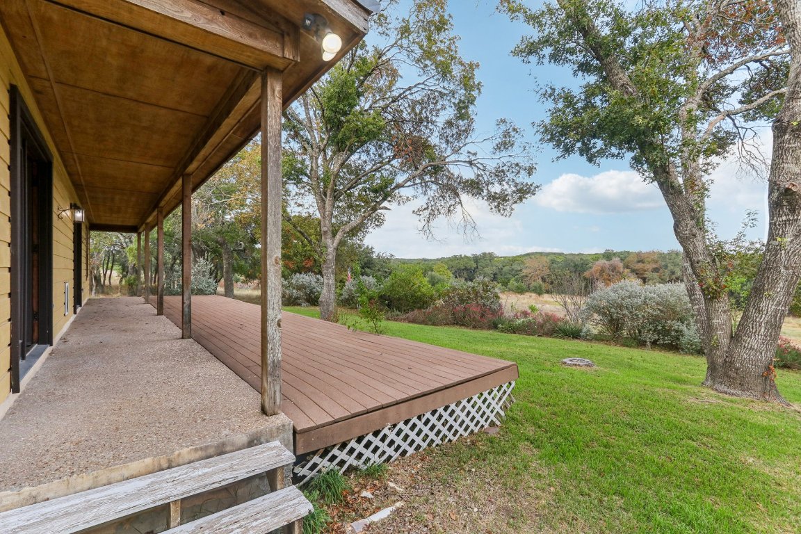 24369-2 Bingham Creek Road, Unit 12 Leander, TX 78641 - Photo 20 of 22 a view of a backyard with large tree