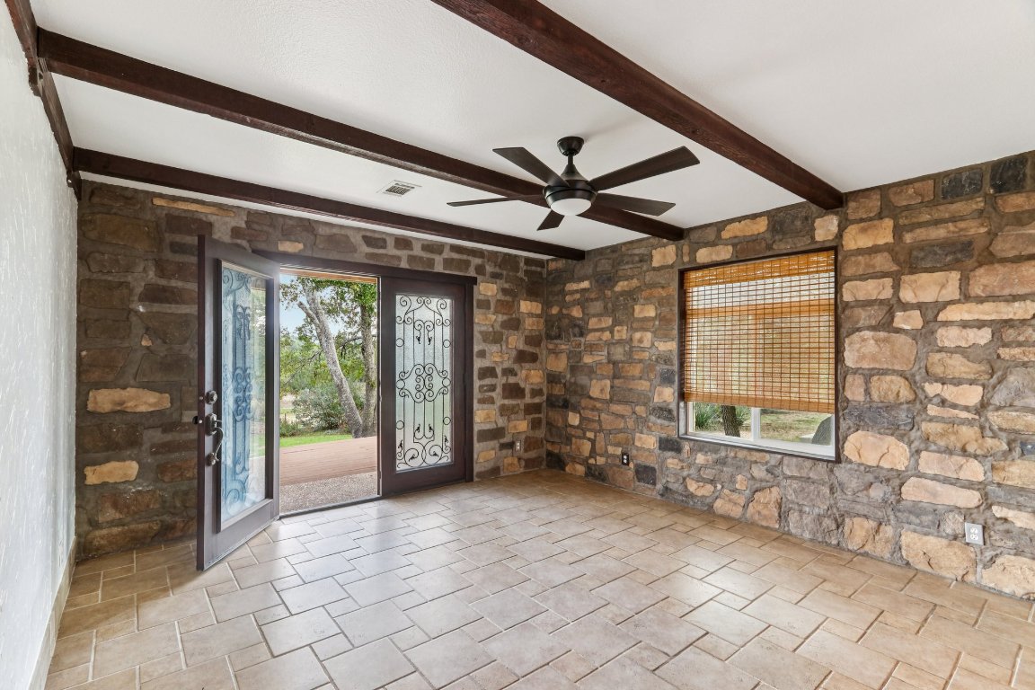 24369-2 Bingham Creek Road, Unit 12 Leander, TX 78641 - Photo 5 of 22 a view of an empty room with a window