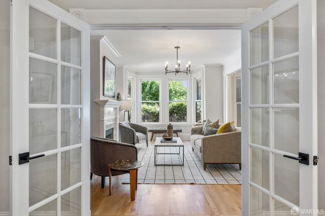 a kitchen with sink stove and cabinets