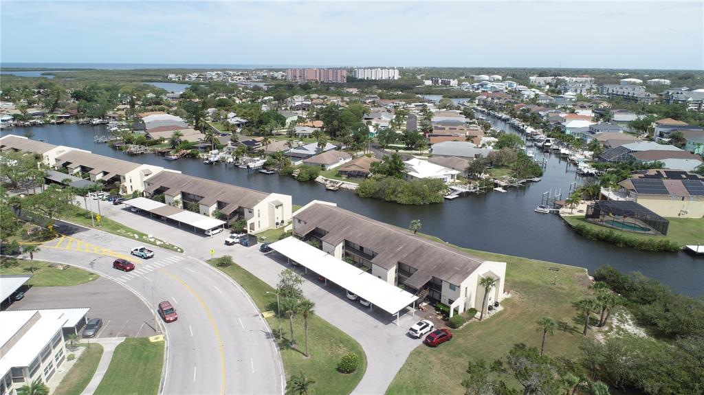 4609 Marine Parkway, Unit 203 New Port Richey, FL 34652 - Photo 1 of 25 an aerial view of a house with a ocean view