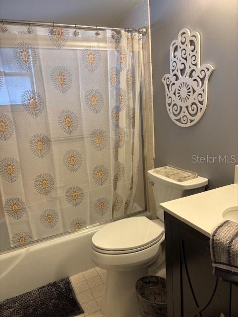 4609 Marine Parkway, Unit 203 New Port Richey, FL 34652 - Photo 16 of 25 a white toilet sitting next to a bath tub