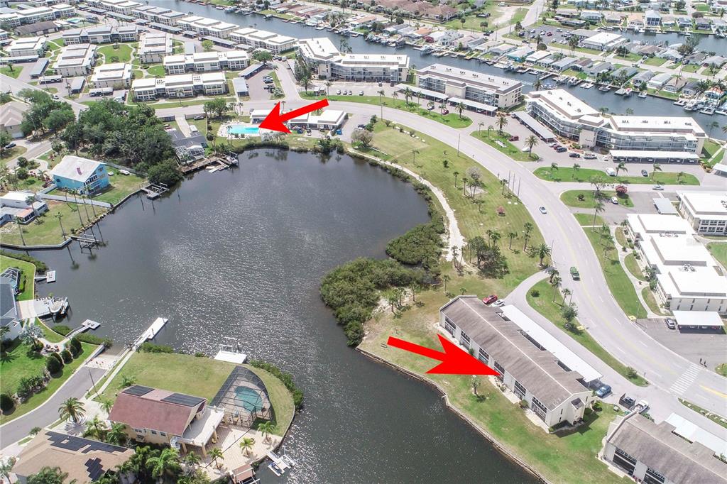4609 Marine Parkway, Unit 203 New Port Richey, FL 34652 - Photo 20 of 25 an aerial view of a swimming pool and outdoor space