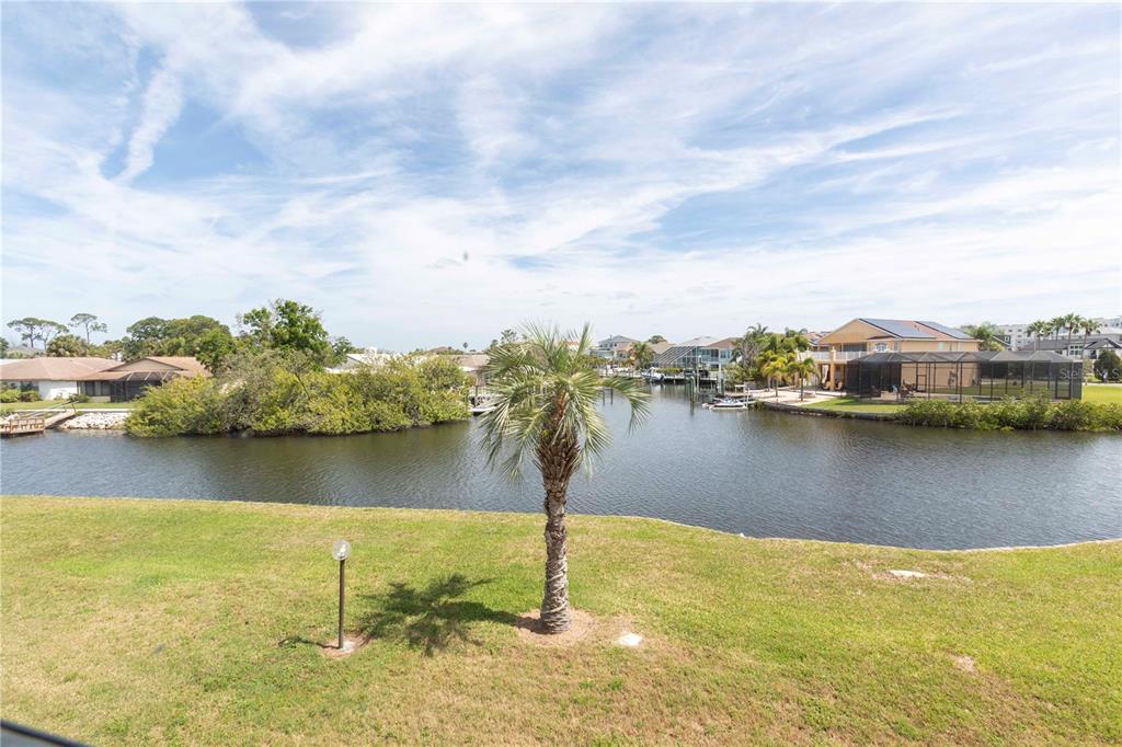 4609 Marine Parkway, Unit 203 New Port Richey, FL 34652 - Photo 2 of 25 a view of a water yard and outdoor seating