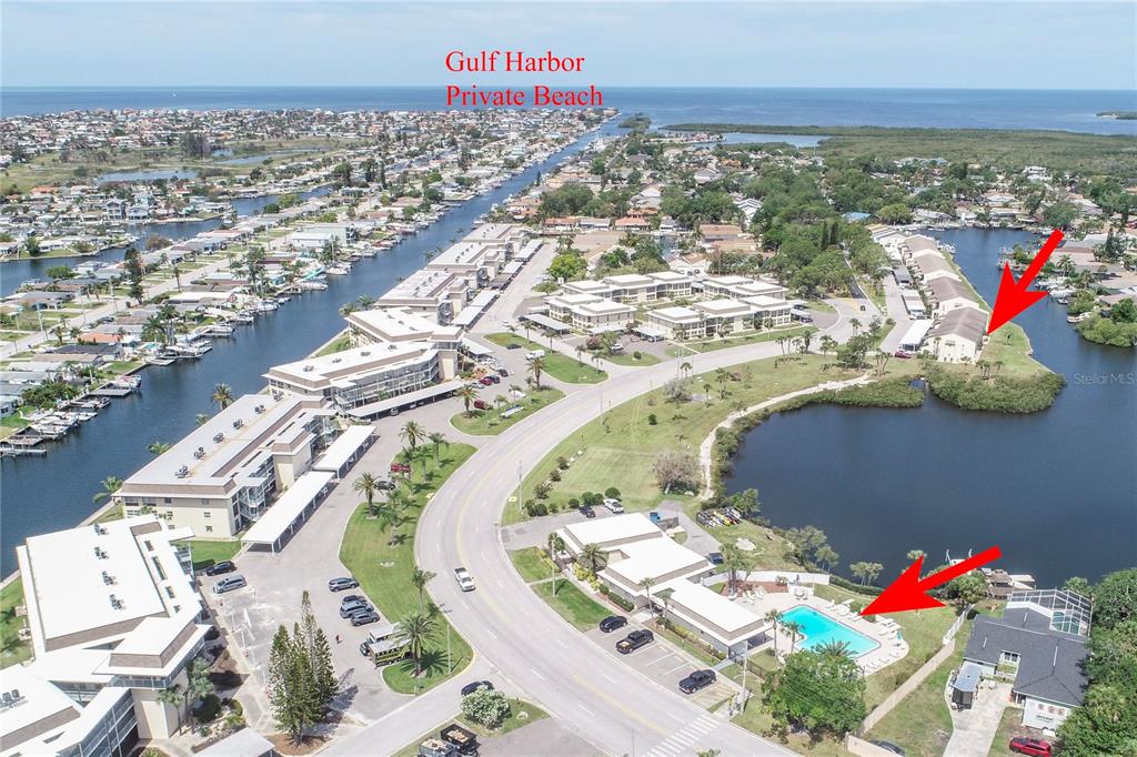 4609 Marine Parkway, Unit 203 New Port Richey, FL 34652 - Photo 21 of 25 an aerial view of a house