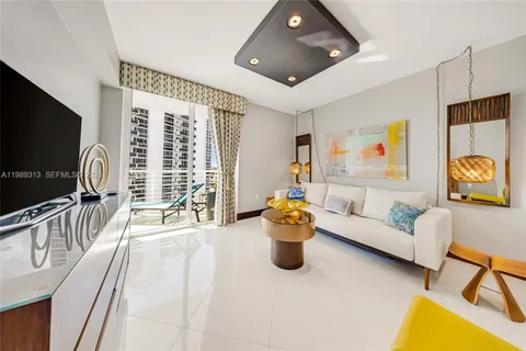 a spacious bathroom with a granite countertop sink toilet and shower