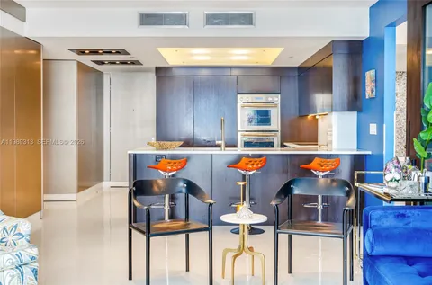 a room with furniture and white walls