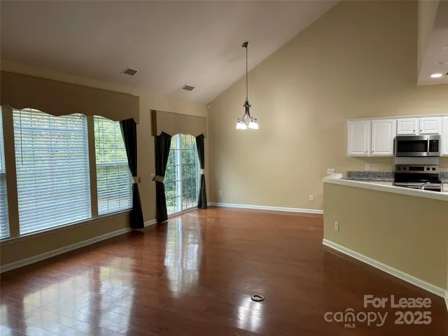 a view of a kitchen with a dishwasher and a kitchen