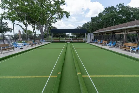 a view of house with garden space and street view