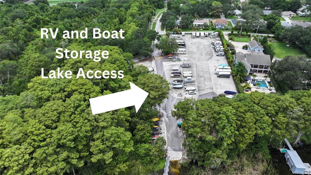 3184 Brunswick Circle Palm Harbor, FL 34684 - Photo 54 of 57 a sign that is sitting in front of flowers