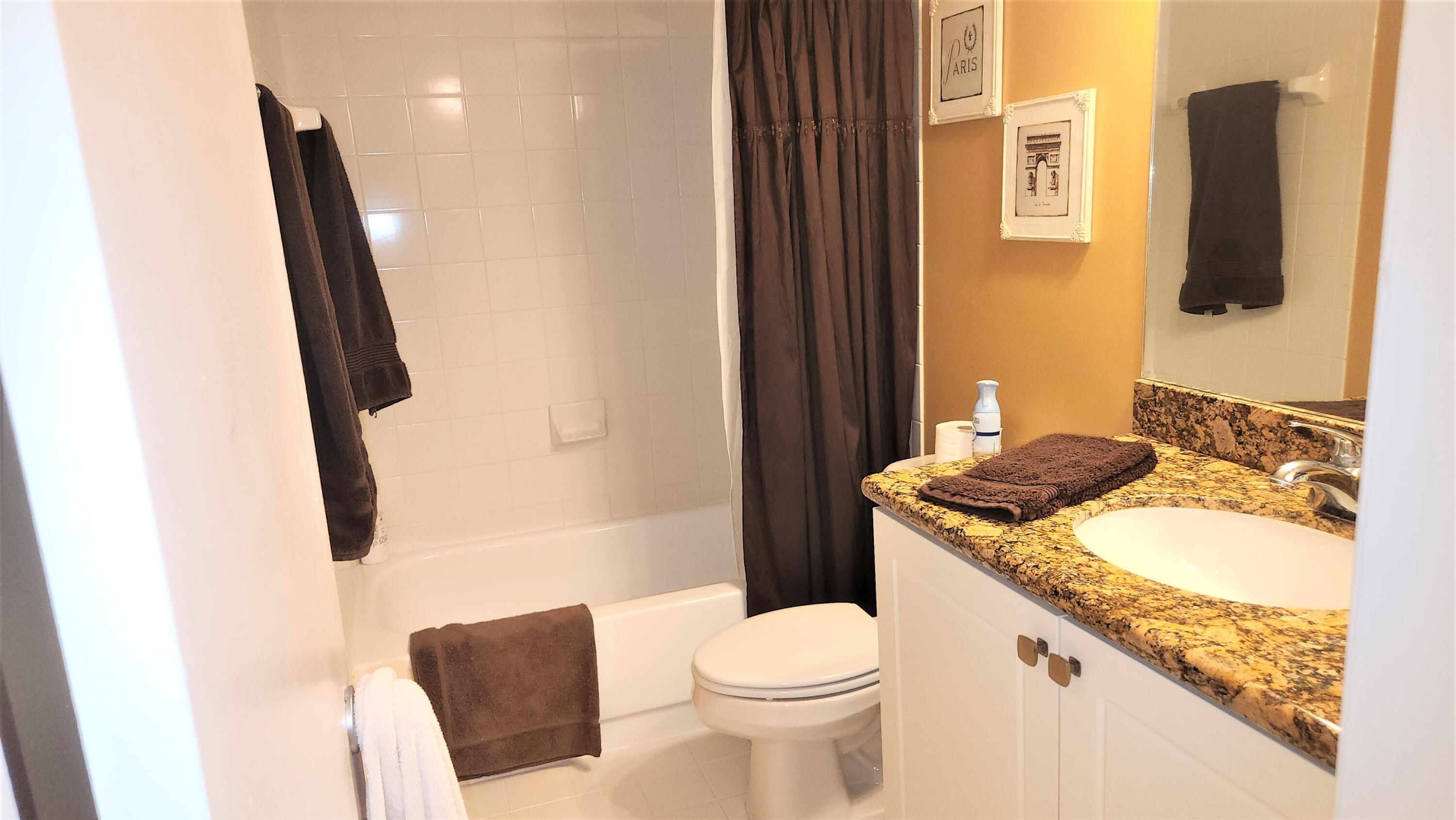 1915 Lavers Circle, Unit E208 Delray Beach, FL 33444 - Photo 11 of 20 2nd bath