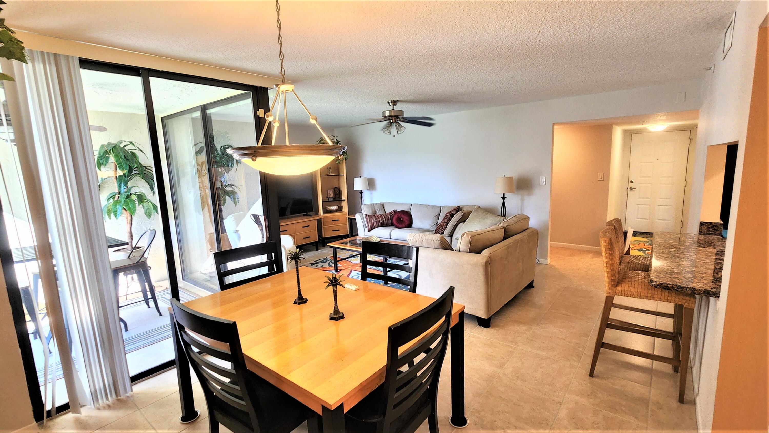 1915 Lavers Circle, Unit E208 Delray Beach, FL 33444 - Photo 2 of 20 living room