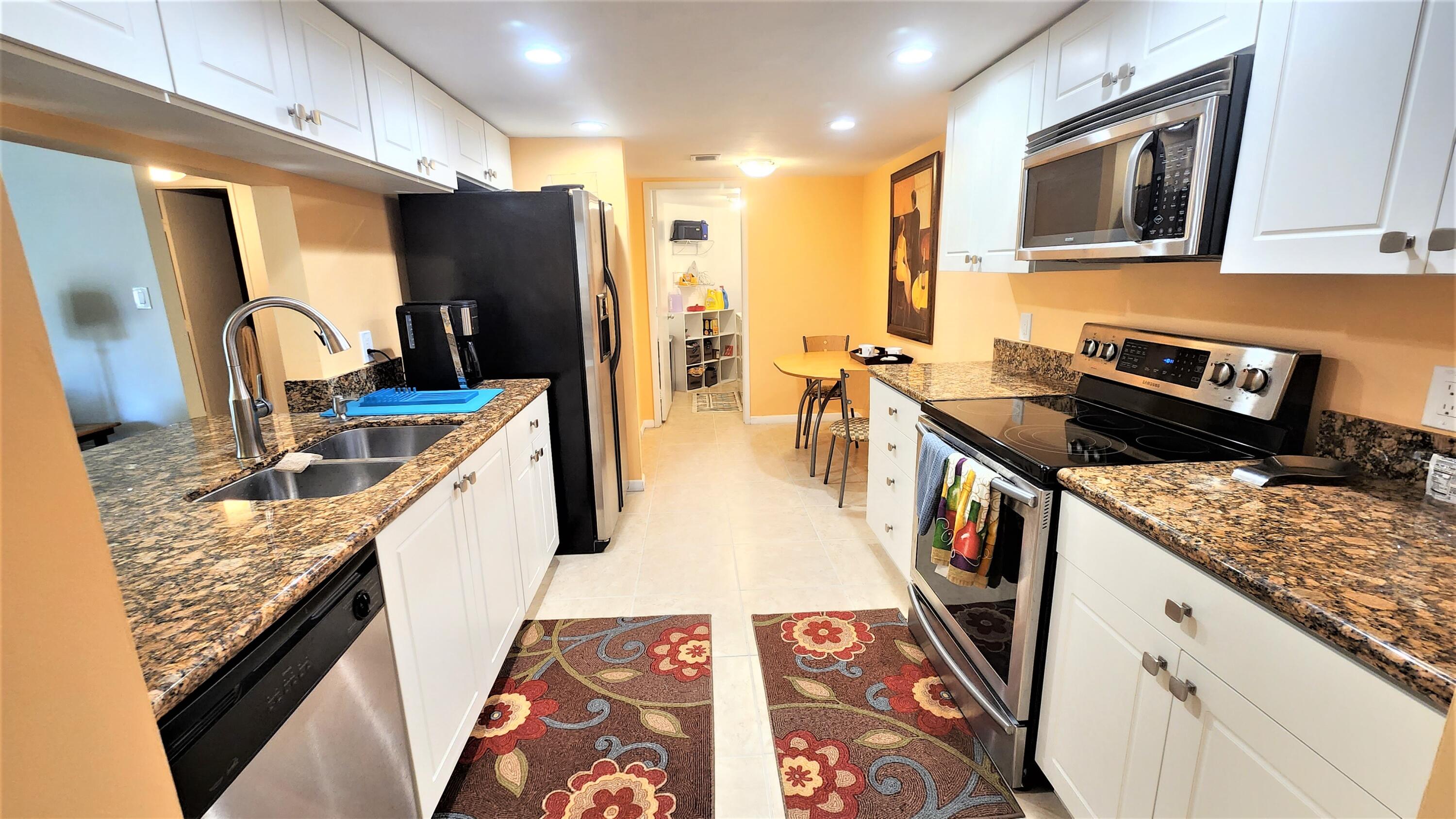 1915 Lavers Circle, Unit E208 Delray Beach, FL 33444 - Photo 6 of 20 kitchen