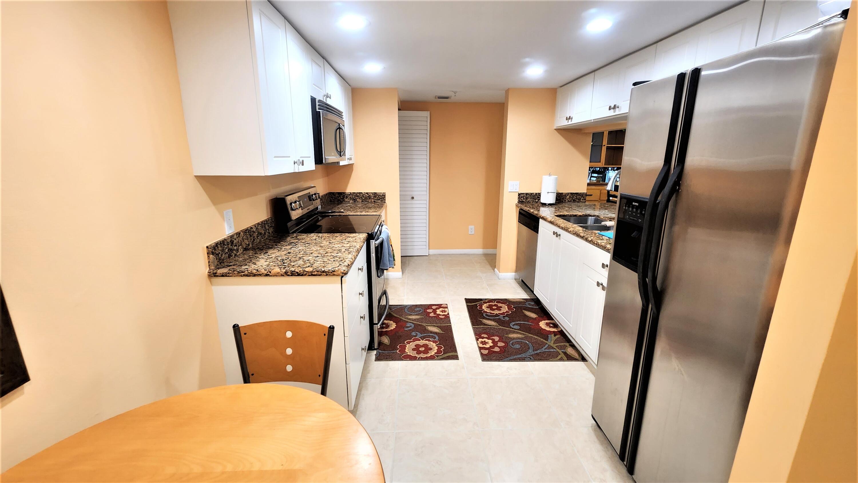 1915 Lavers Circle, Unit E208 Delray Beach, FL 33444 - Photo 7 of 20 kitchen