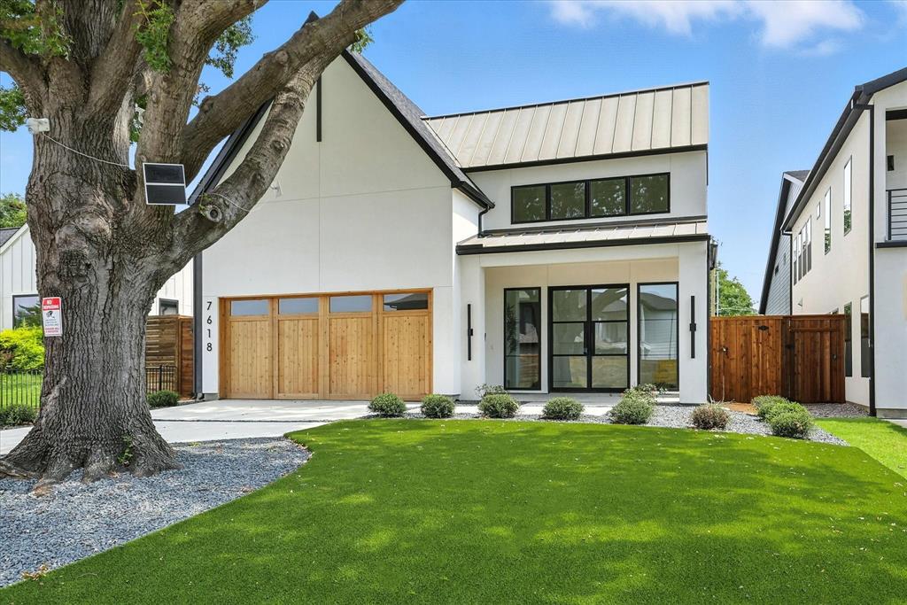 7618 Roper Street Dallas, TX 75209 - Photo 1 of 35 a front view of a house with garden