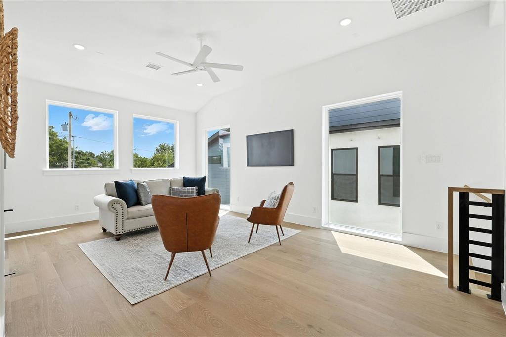 7618 Roper Street Dallas, TX 75209 - Photo 28 of 35 a living room with furniture and a window