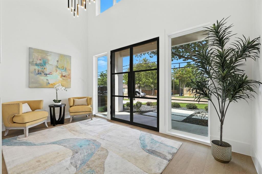 7618 Roper Street Dallas, TX 75209 - Photo 3 of 35 a living room with furniture and a large window