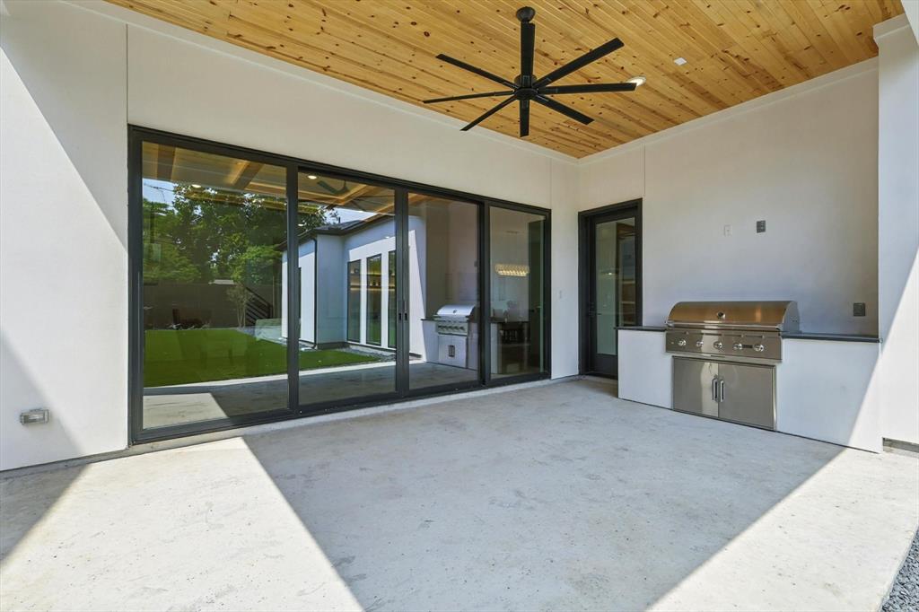 7618 Roper Street Dallas, TX 75209 - Photo 32 of 35 a view of livingroom with kitchen