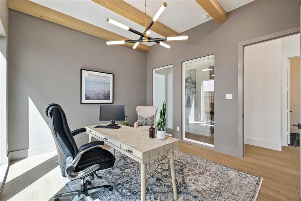7618 Roper Street Dallas, TX 75209 - Photo 5 of 35 a work room with furniture and a rug