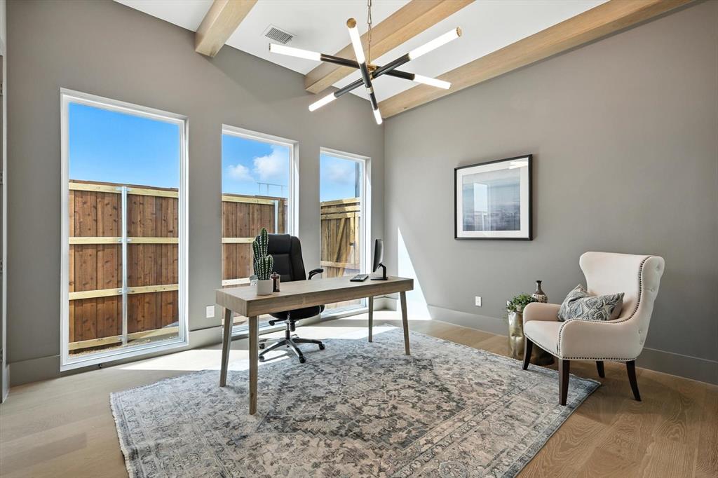 7618 Roper Street Dallas, TX 75209 - Photo 6 of 35 a work room with furniture and a rug