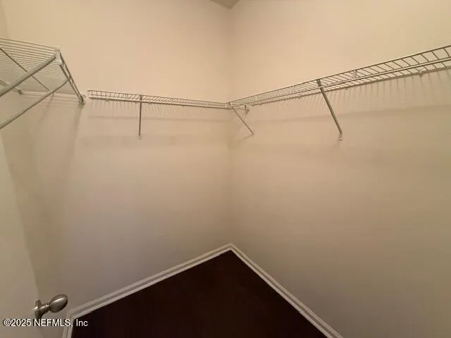 a view of a room with racks on the wall