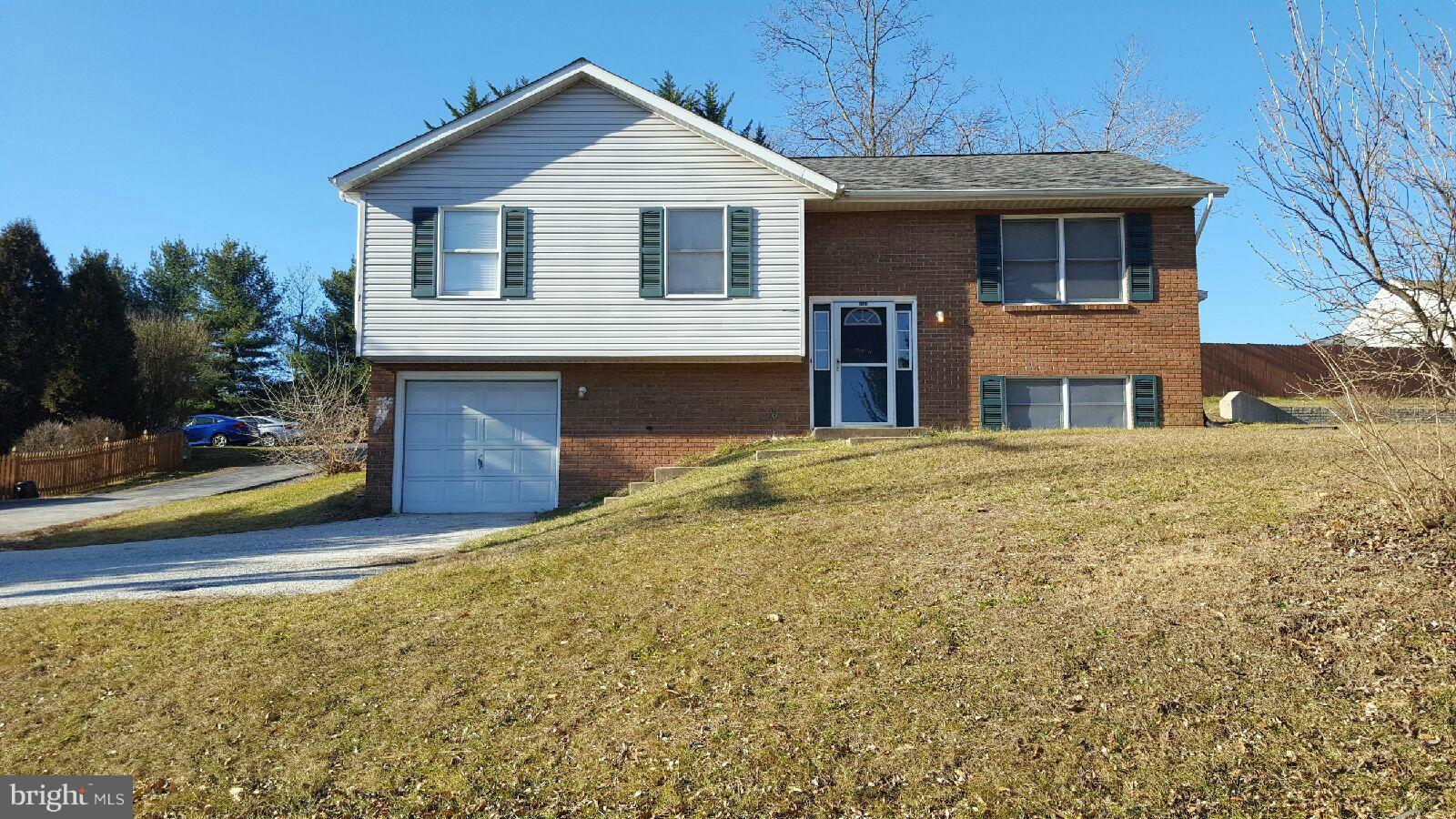 6624 Ridge Road Eldersburg, MD 21784 - Photo 1 of 20 a front view of a house with a yard