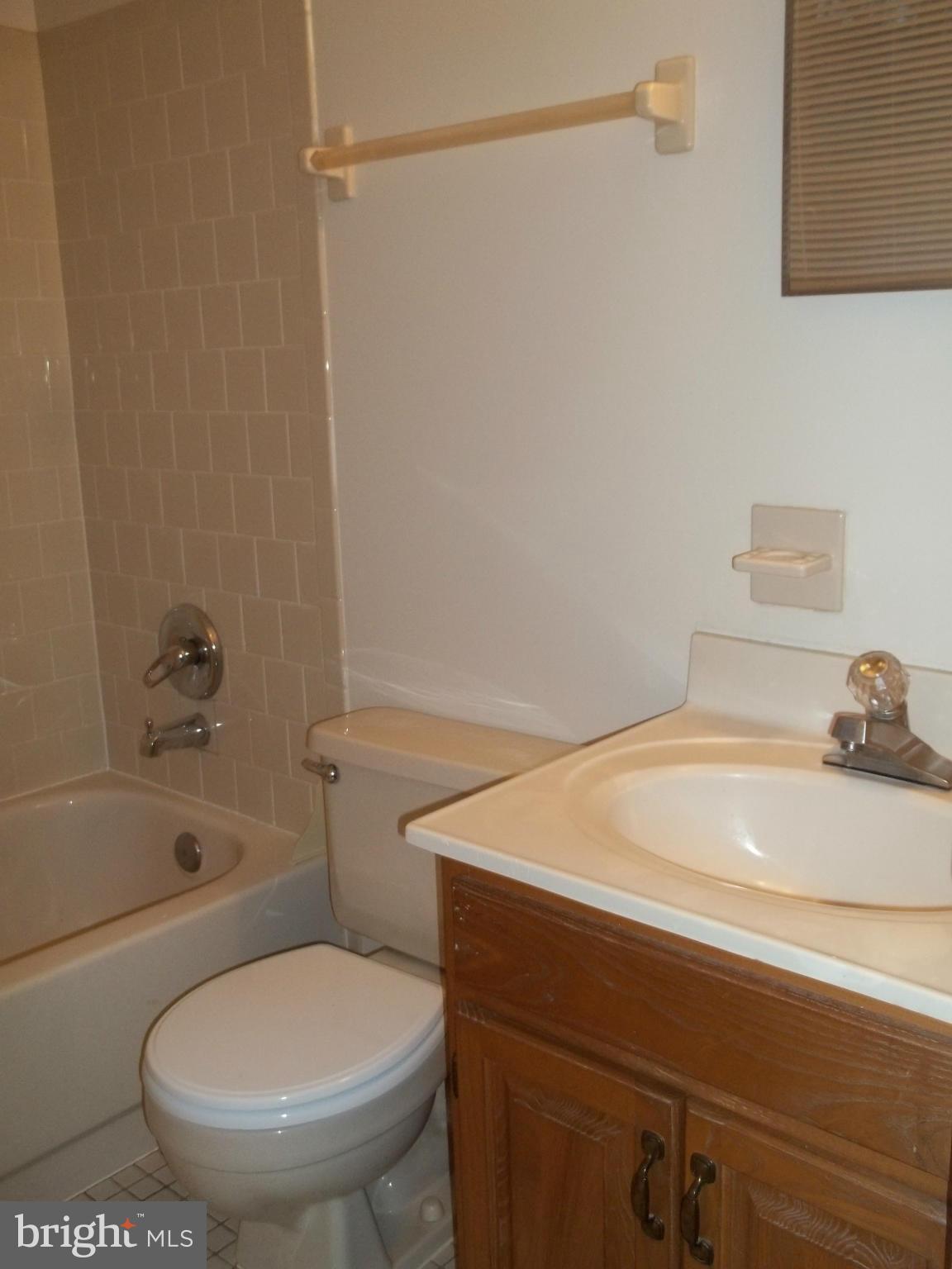 6624 Ridge Road Eldersburg, MD 21784 - Photo 12 of 20 a bathroom with a sink and a toilet