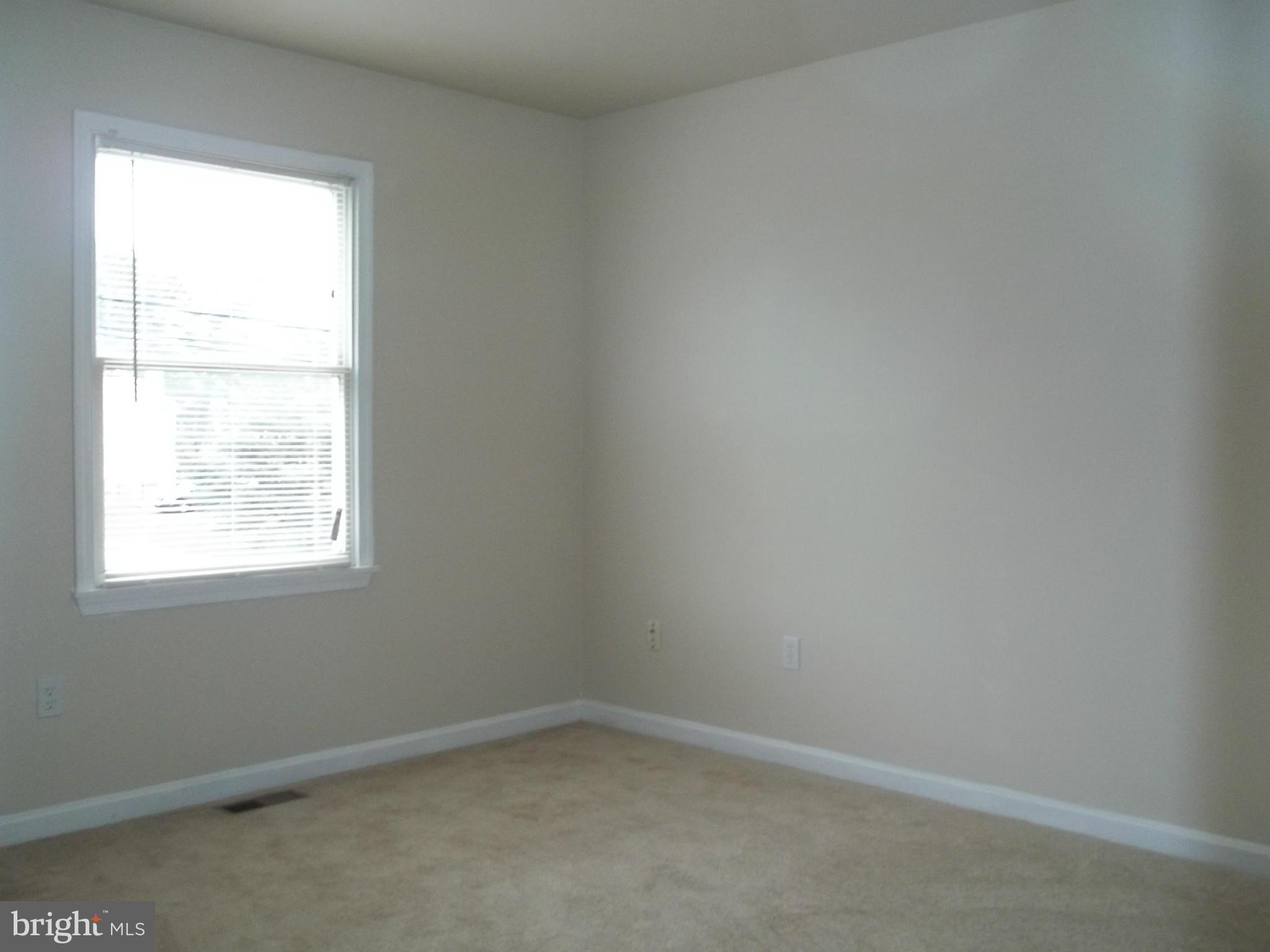 6624 Ridge Road Eldersburg, MD 21784 - Photo 14 of 20 an empty room with a window