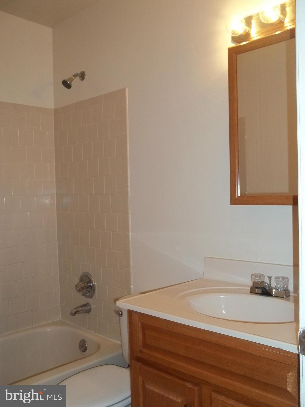 6624 Ridge Road Eldersburg, MD 21784 - Photo 15 of 20 a bathroom with a bathtub and a shower