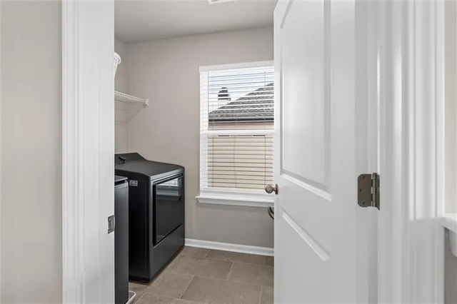 an empty room with a bathroom