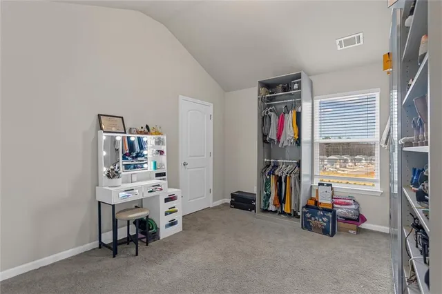 a view of a bathroom from a hallway