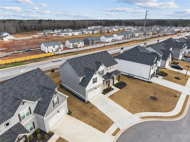 a picture of a bathroom with a white wall and a white wall