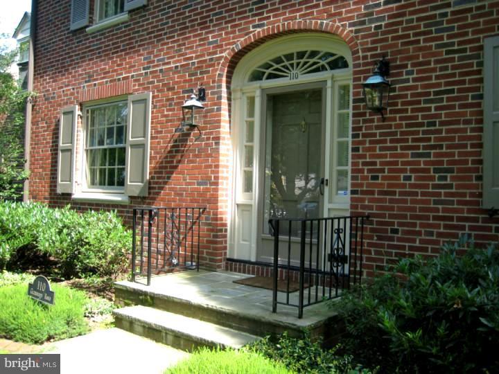 110 Glenwood Road Haddonfield, NJ 08033 - Photo 2 of 17 a view of a brick house with a small garden