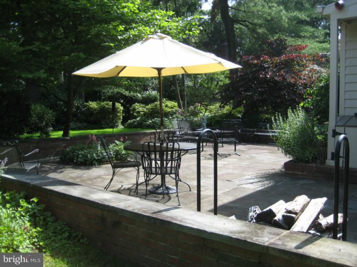 110 Glenwood Road Haddonfield, NJ 08033 - Photo 16 of 17 a swimming pool with outdoor seating and yard