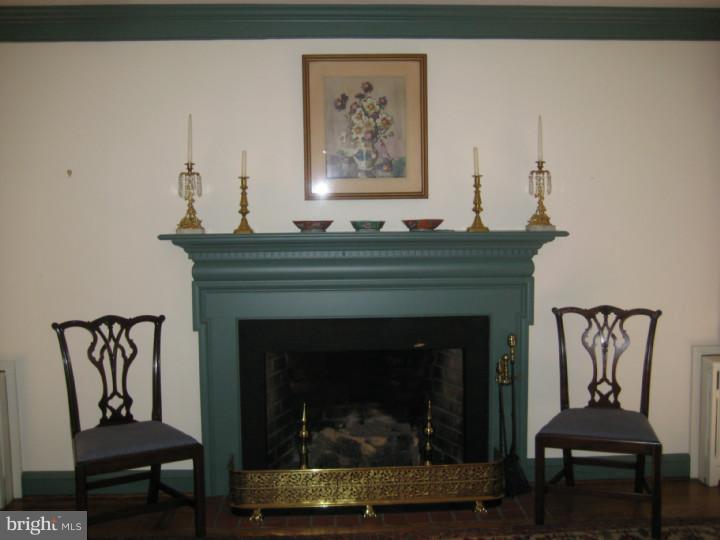 110 Glenwood Road Haddonfield, NJ 08033 - Photo 5 of 17 a living room with furniture and a fireplace