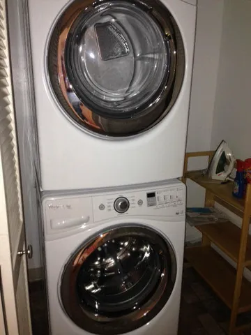 a view of a living room and kitchen