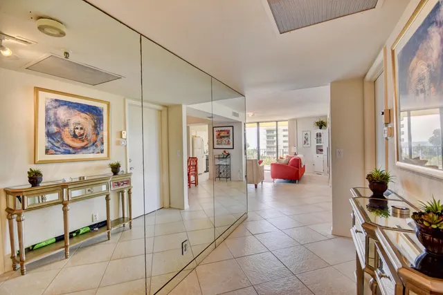 a lobby with furniture and window