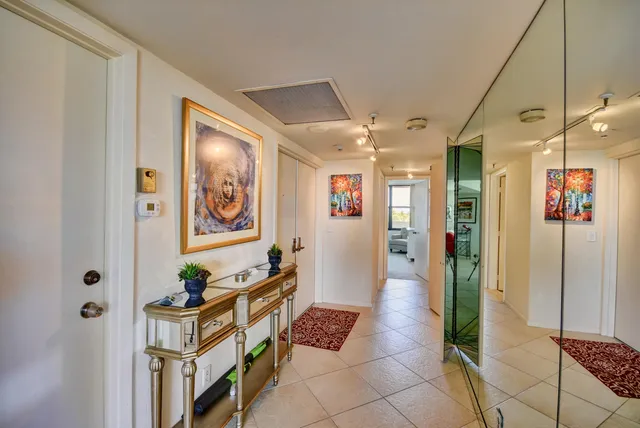 a view of hallway with furniture