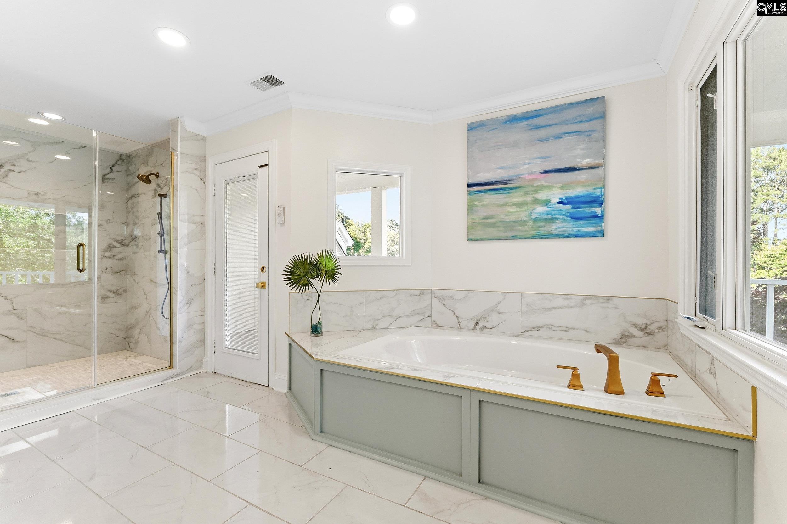 121 Silver Lake Road East Columbia, SC 29223 - Photo 41 of 57 a bathroom with a bathtub and a sink