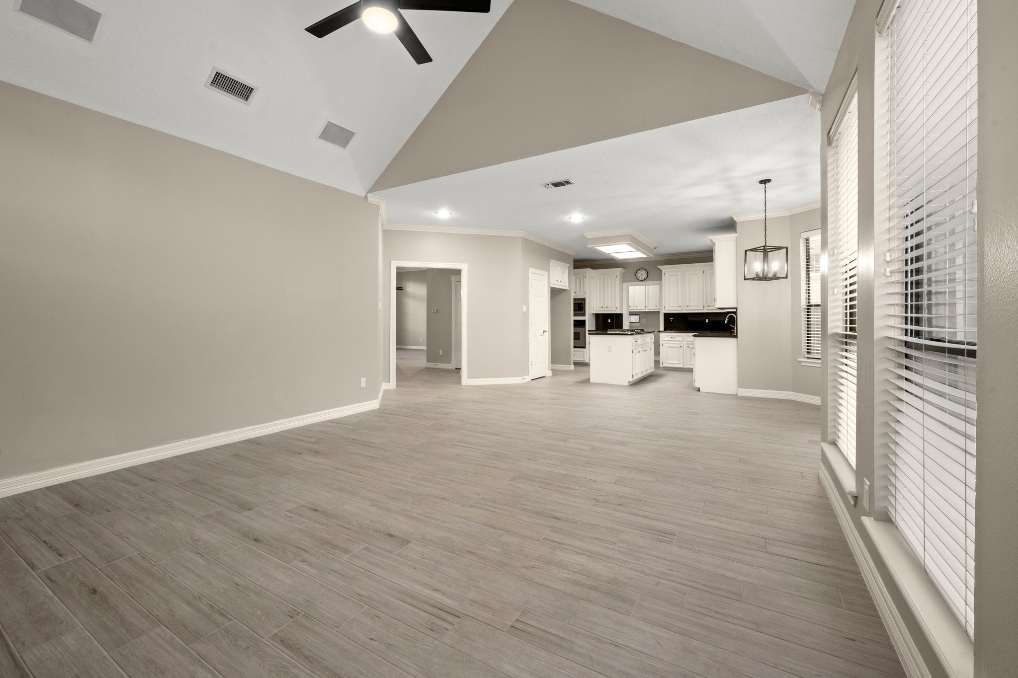 8222 Redchurch Drive Spring, TX 77379 - Photo 17 of 36 a view of a kitchen with a refrigerator and a window